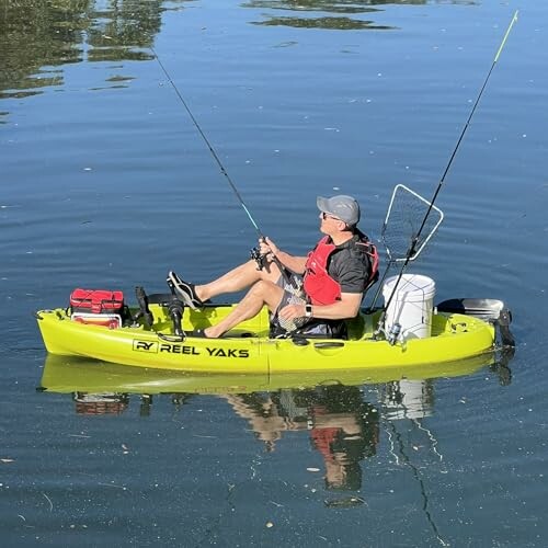 Man fishing from a kayak on a calm lake