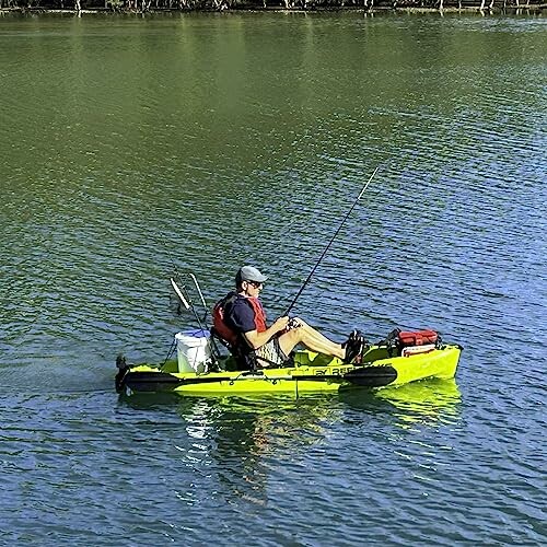 Person fishing from a yellow kayak on a lake