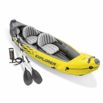 Yellow and gray inflatable kayak with paddles and pump.